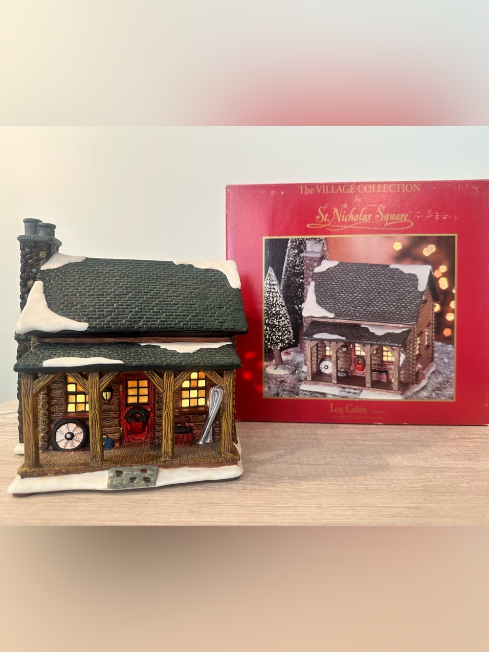 St. Nicholas Square Village - Log Cabin